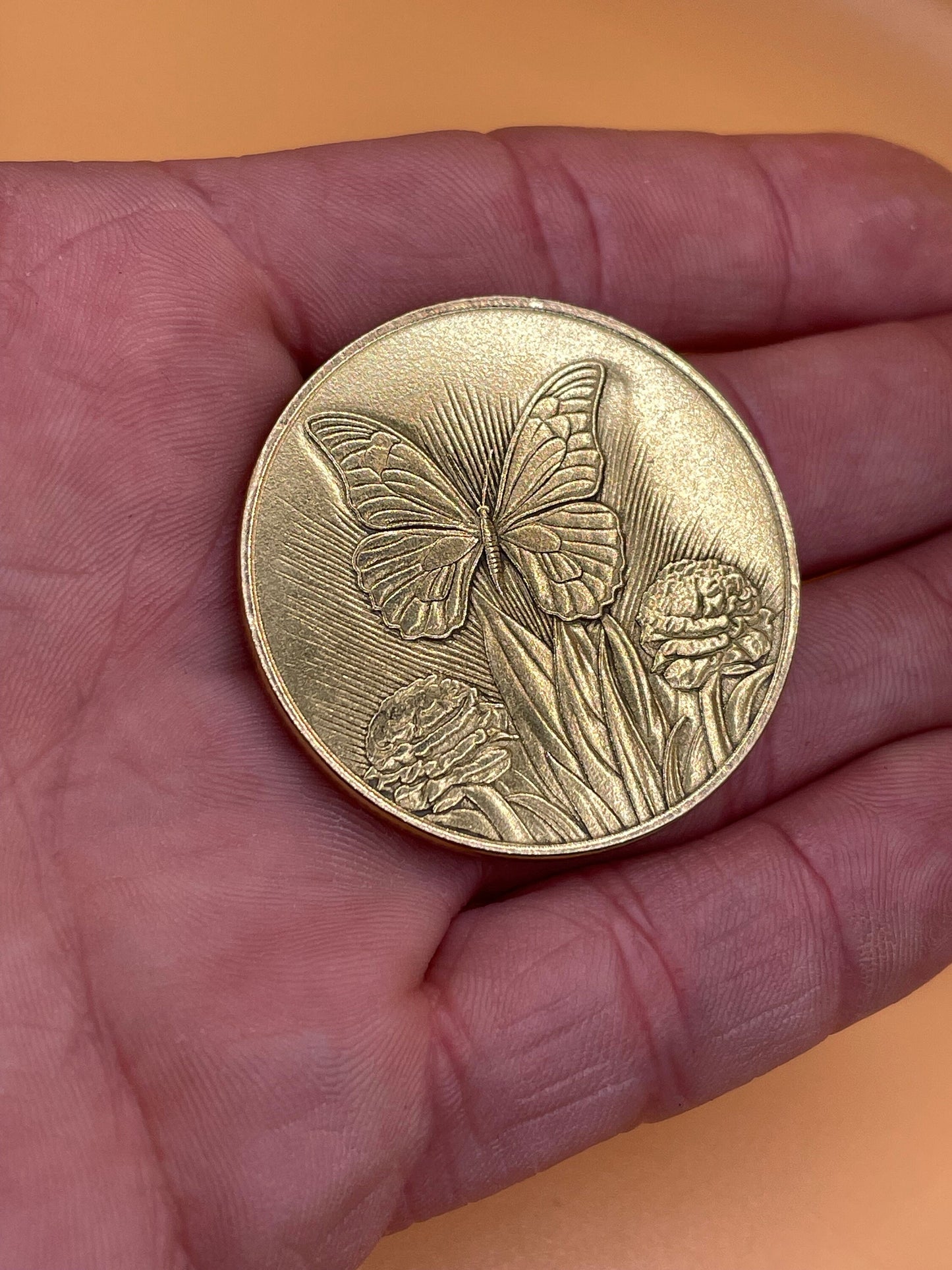 Whimsical Flutter - Brass Coin with Butterfly and Hydrangeas